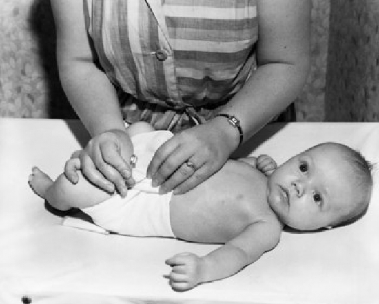 SAL2559300 Mid Section View of a Woman Changing Her Babys Diaper Poster Print - 18 x 24 in.