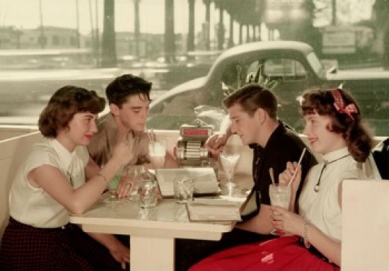 Side Profile of Two Young Couples Drinking Milkshakes at a Restaurant Poster Print - 18 x 24 in.