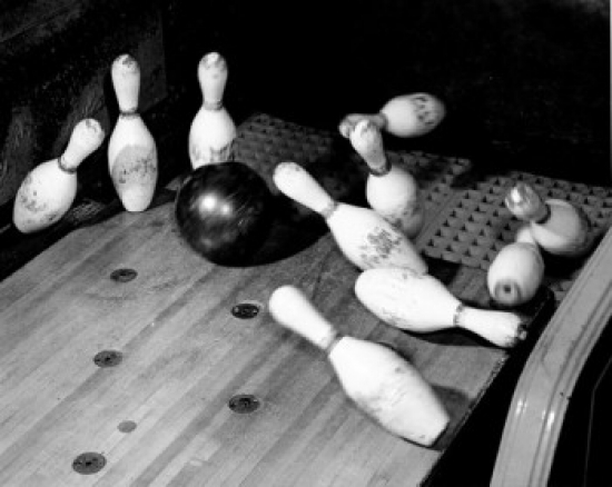 High Angle View of a Bowling Ball Knocking Down Bowling Pins Poster Print - 18 x 24 in.