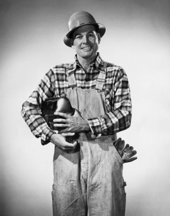 Construction Worker Holding a Lunch Box & Smiling Poster Print - 18 x 24 in.