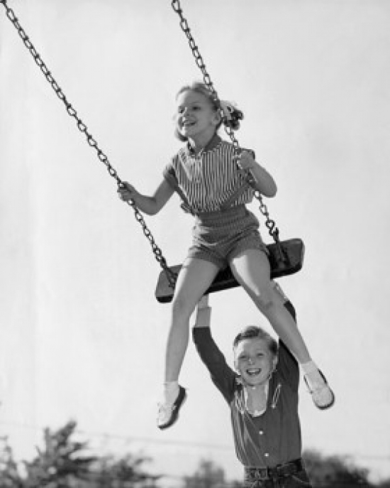 Boy Pushing His Sister on a Swing Poster Print - 18 x 24 in.
