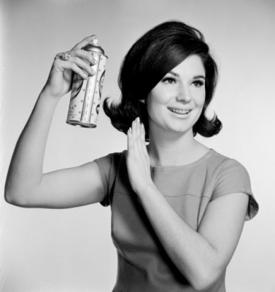 Young Woman Using Hairspray Poster Print - 18 x 24 in.