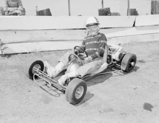 Boy on Kart Racing Poster Print - 18 x 24 in.