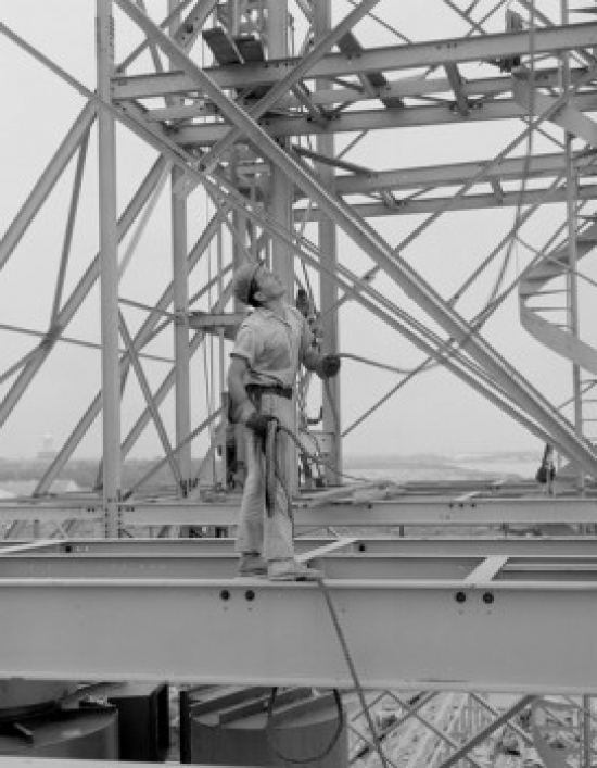 Man Working on Construction Site Poster Print - 18 x 24 in.
