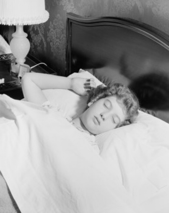 Young Woman Sleeping in Bed Poster Print - 18 x 24 in.