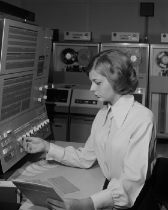 Woman Working in Studio Adjusting Knobs Poster Print - 18 x 24 in.