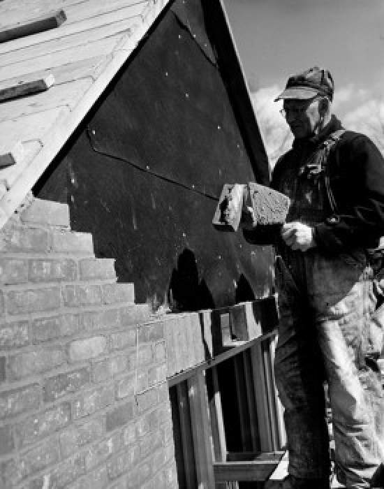 Mature Man Making Brick Layer on Building Poster Print - 18 x 24 in.