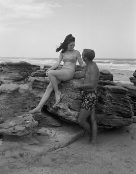 Young Couple Relaxing on Beach Poster Print - 18 x 24 in.