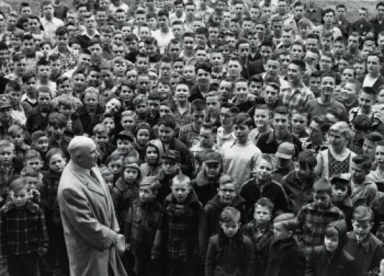 High Angle View of a School Principal Giving a Speech to His Students Poster Print - 18 x 24 in.