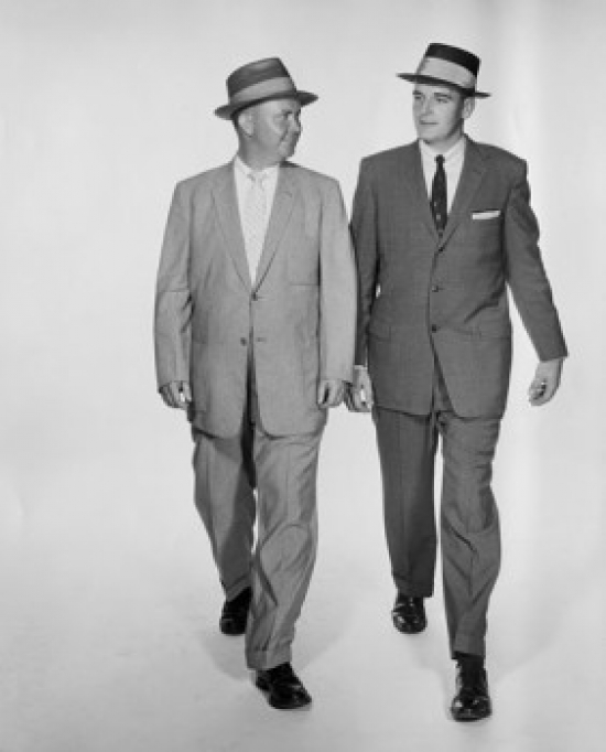 Two Businessmen Walking Side by Side Poster Print - 18 x 24 in.