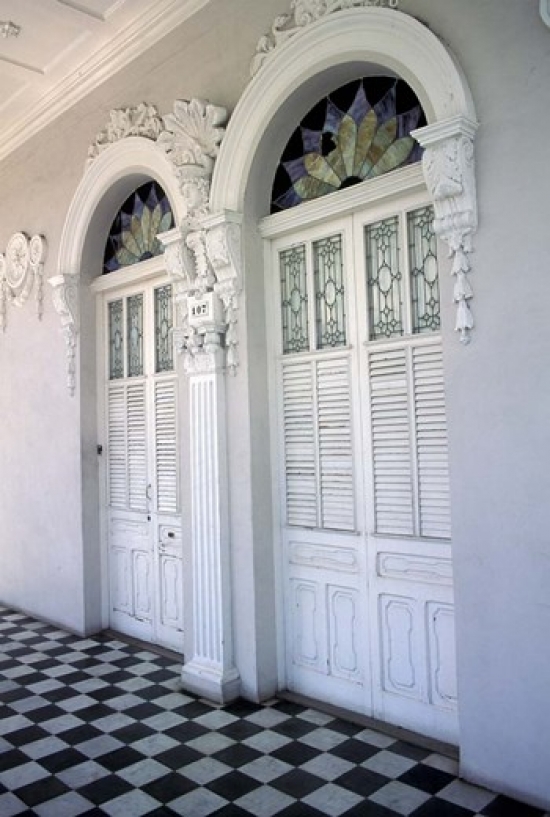 Historic District Doors with Stucco Decor & Tiled Floor Puerto Rico Print by Michele Molinari