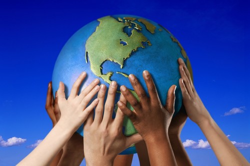 Hands On A Globe Poster Print by Don Hammond, 17 x 11