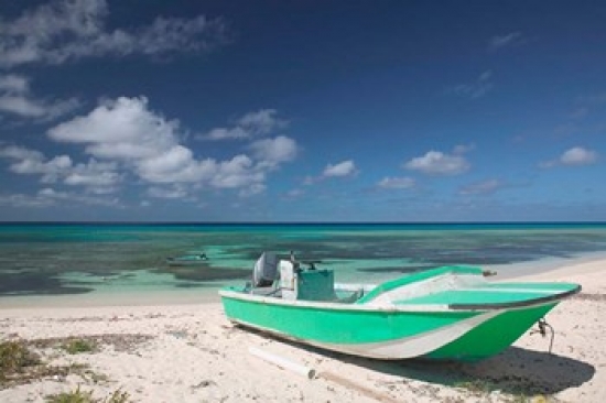 Boat & Turquoise Water on Pillory Beach Turks & Caicos Caribbean Print by Walter Bibikow