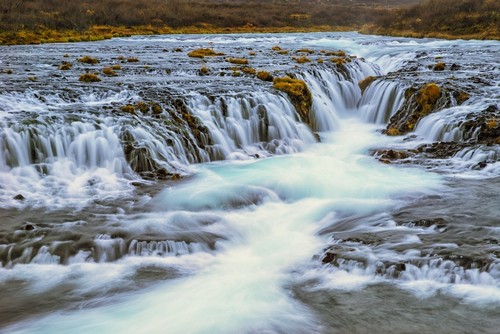 Water Cascading Over Rocks & Flowing into A River - Bruarfoss Iceland Poster Print by Robert Postma, 38 x 24 - Large
