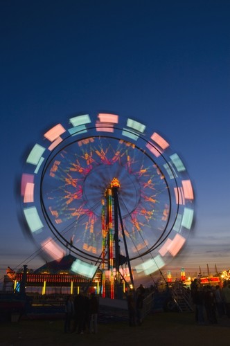 Time Delay Ferris Wheel Poster Print by Corey Hochachka - 11 x 17