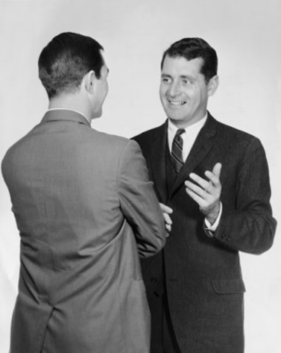 Two Businessmen Talking Poster Print - 18 x 24 in.