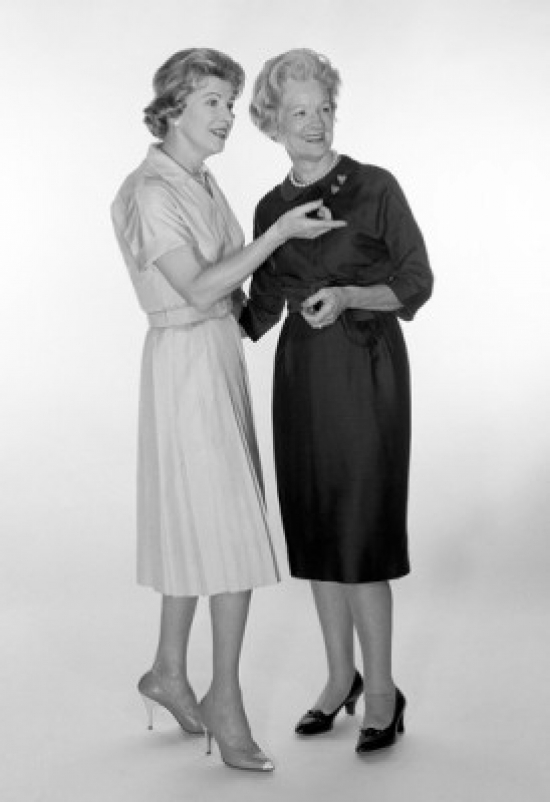 Women Talking Studio Shot Poster Print - 18 x 24 in.