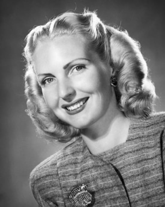 Portrait of a Young Woman Smiling Poster Print - 18 x 24 in.