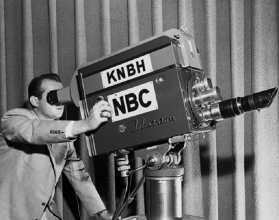 Camera Operator in a Television Studio Poster Print - 18 x 24 in.