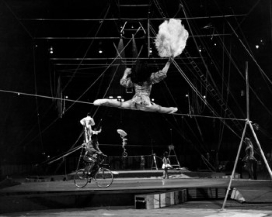 Tightrope Walker Performing in a Circus Poster Print 18 x 24 in.