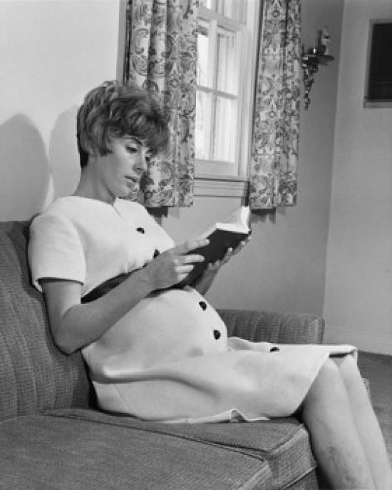 SAL2557523 Side Profile of a Pregnant Woman Reading a Book Poster Print - 18 x 24 in.