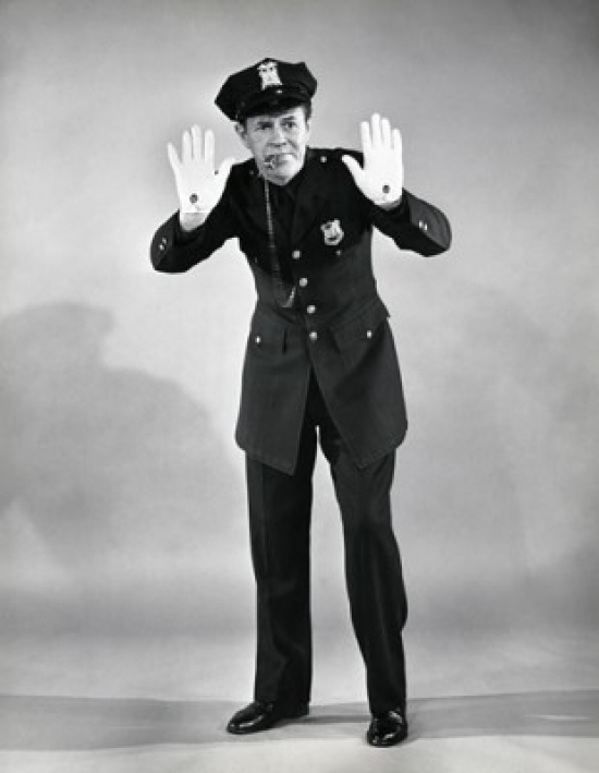 Police Officer Making a Stop Gesture Poster Print - 18 x 24 in.