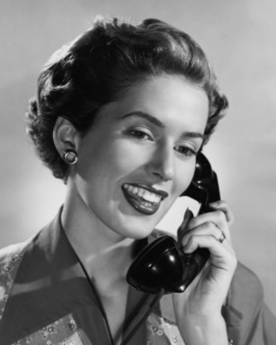 Close-Up of a Young Woman Talking on the Telephone Poster Print - 18 x 24 in.