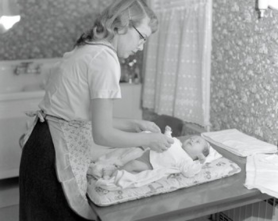 Mother Changing 5 Week Old Babys Diaper Poster Print - 18 x 24 in.
