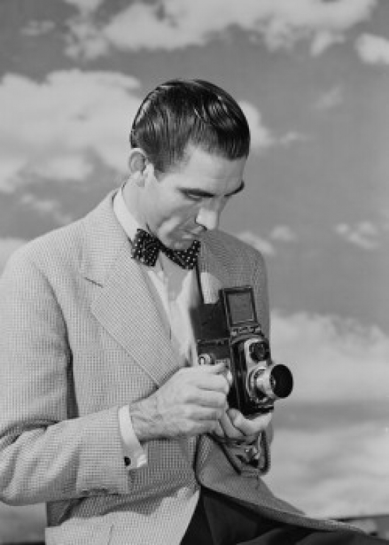 Man Using Camera Poster Print - 18 x 24 in.