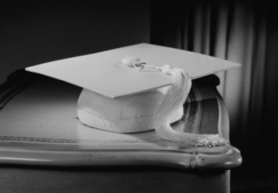 Graduation Mortar Board on Bedside Table Poster Print - 18 x 24 in.