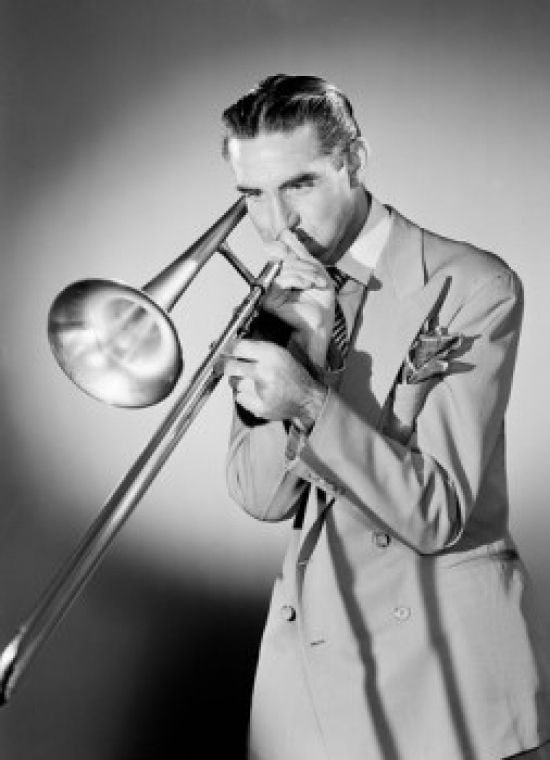 Studio Shot of Man Playing Trombone Poster Print - 18 x 24 in.