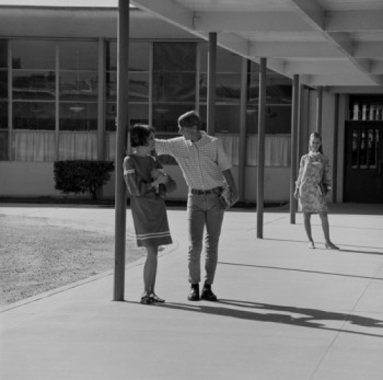 Students Flirting at Campus Poster Print - 18 x 24 in.
