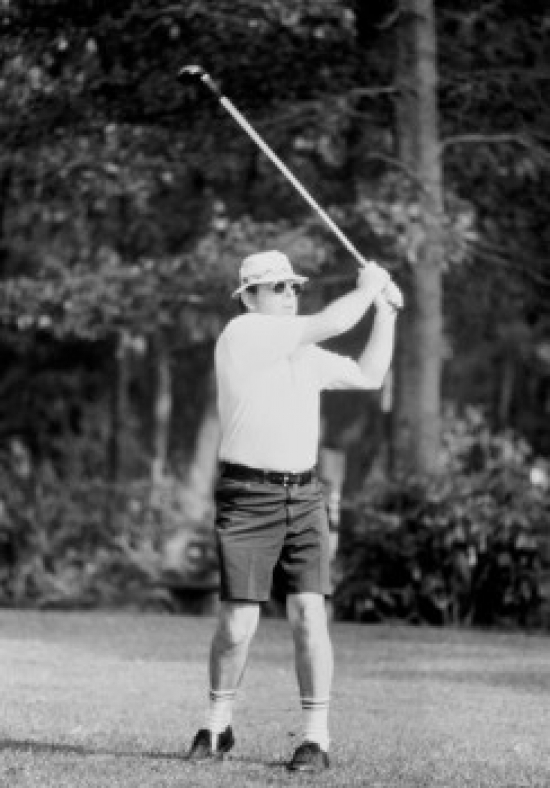 Man Playing Golf Poster Print - 18 x 24 in.