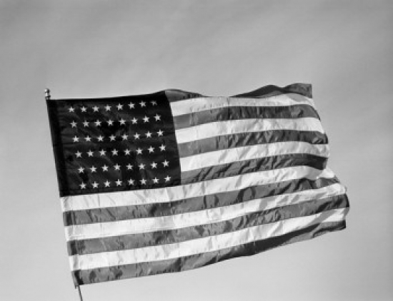 SAL255422513 American Flag Flying Against Sky Poster Print - 18 x 24 in.