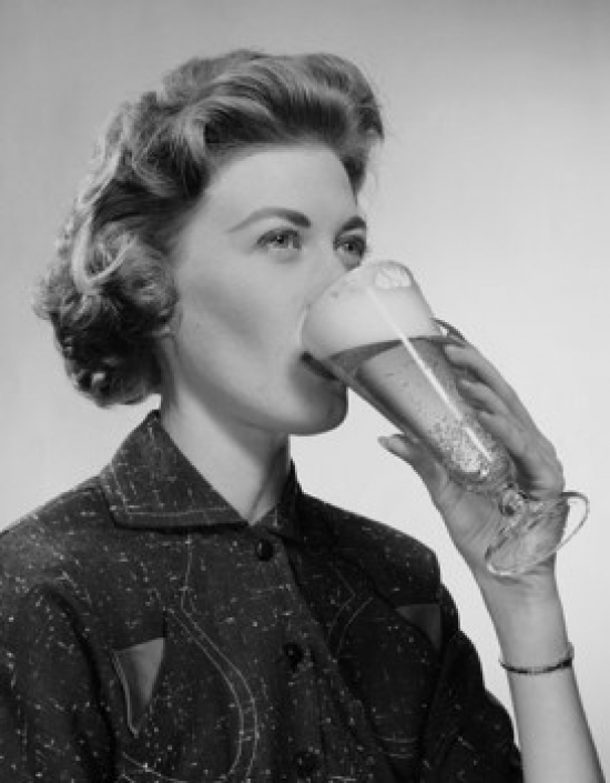 Young Woman Drinking Beer Poster Print - 18 x 24 in.