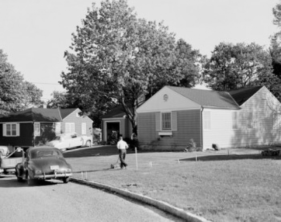 Man Mowing Lawn on Suburbs Poster Print - 18 x 24 in.