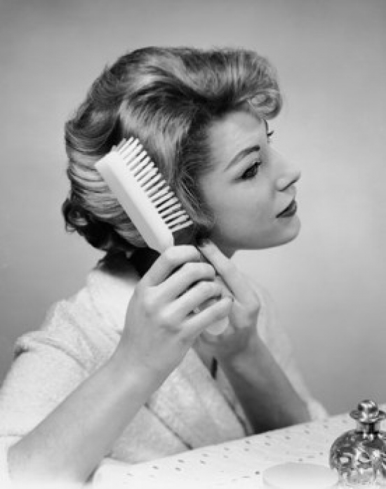 SAL25542517 Close-Up of a Young Woman Brushing Her Hair Poster Print - 18 x 24 in.