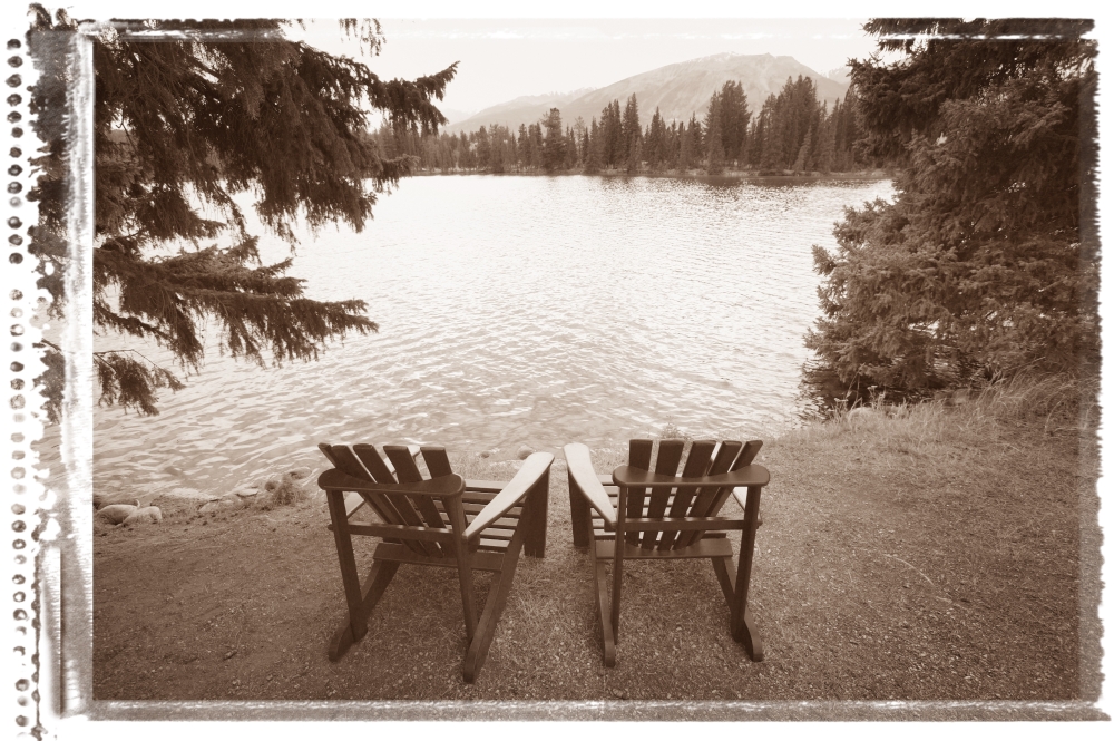Empty Chairs On Waterfront Poster Print by Don Hammond - 17 x 11