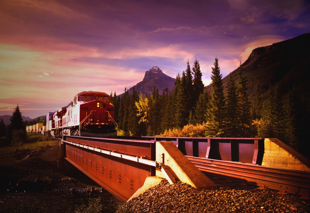 DPI1778334 Train Going Over A Bridge - Banff National Park Alberta Canada Poster Print by Darren Greenwood, 17 x 11