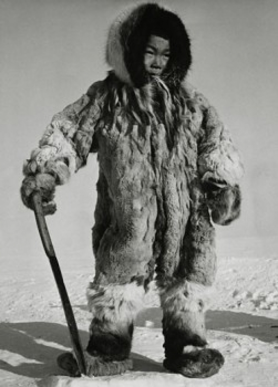 Eskimo Boy Standing on Ice & Holding a Knife Poster Print - 18 x 24 in.