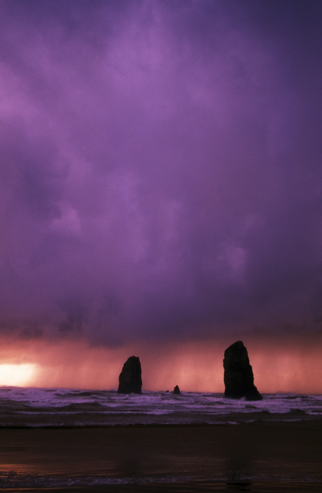 Sunset Over Needles On The Ocean At Cannon Beach Poster Print by Natural Selection Craig Tuttle - 12 x 18