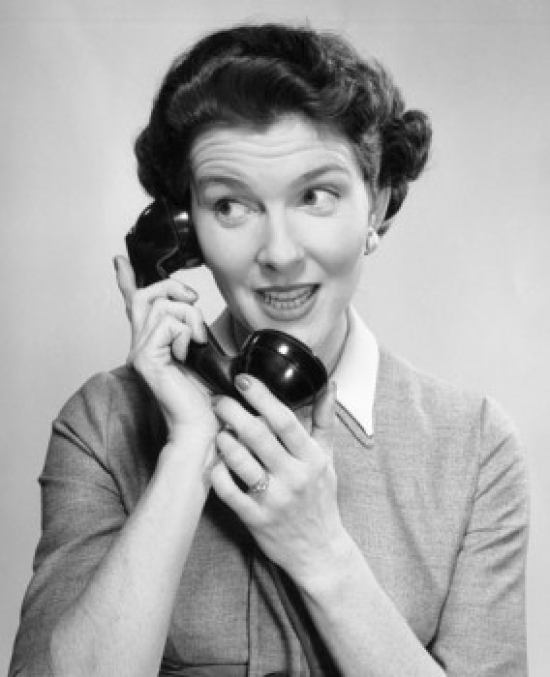 Close-Up of a Young Woman Talking on the Telephone Poster Print - 18 x 24 in.