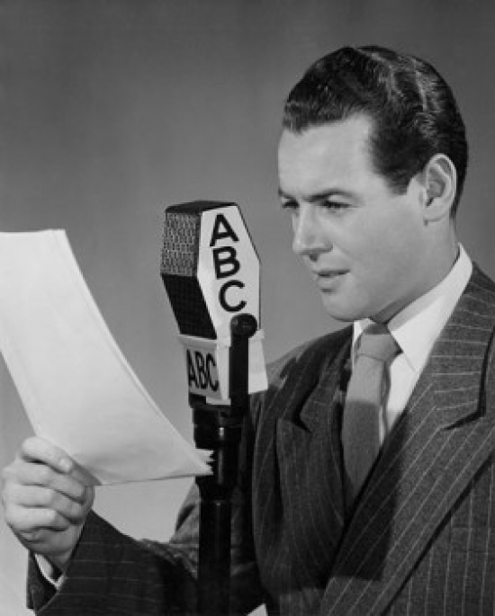 Mid Adult Man Reading a Report Into a Microphone Poster Print
