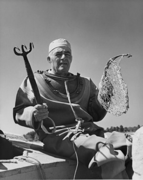 Sponge Diver Holding Hook & Fishing Net Poster Print