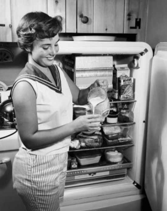 SAL2554791 Side Profile of a Young Woman Standing Near a Refrigerator Pouring Milk Poster Print - 18 x 24 in -  Posterazzi