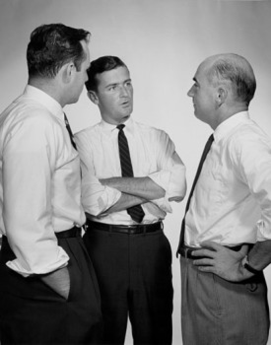Three Businessmen Talking Poster Print - 18 x 24 in.
