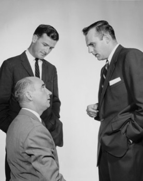 Three Businessmen Talking Poster Print - 18 x 24 in.
