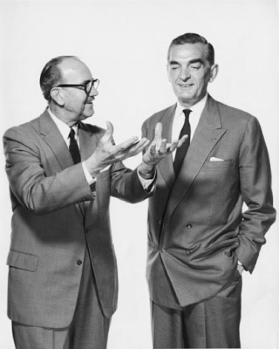 Two Businessmen Talking Poster Print - 18 x 24 in.