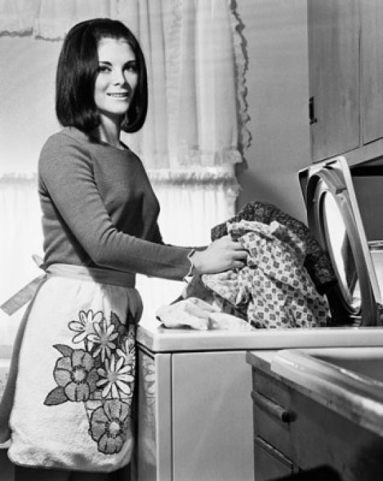 SAL2555139 Portrait of a Young Woman Taking Clothes Out of a Washing Machine Poster Print - 18 x 24 in.