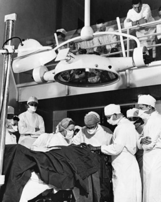 Group of Surgeons Performing an Operation in an Operating Room While Students Watch Poster Print - 18 x 24 in.